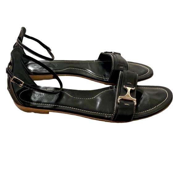 Tod's Shoes - Tod’s Black Flat Sandals With Ankle Strap, Silver Hardware Detailing.